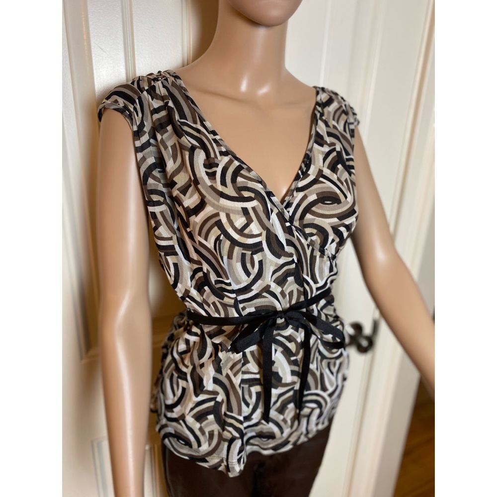 Faux wrap sleeveless top with tie
